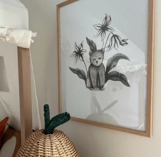 Kids Room with a bear illustration framed art print hanged on the walls