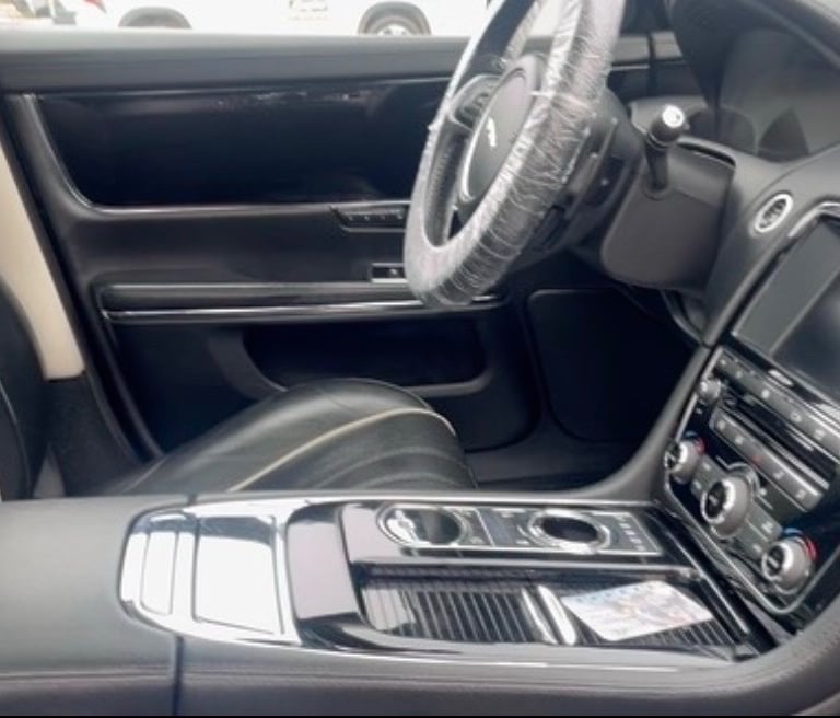 Modern vehicle interior detailing dashboard cleaning Jackson MI