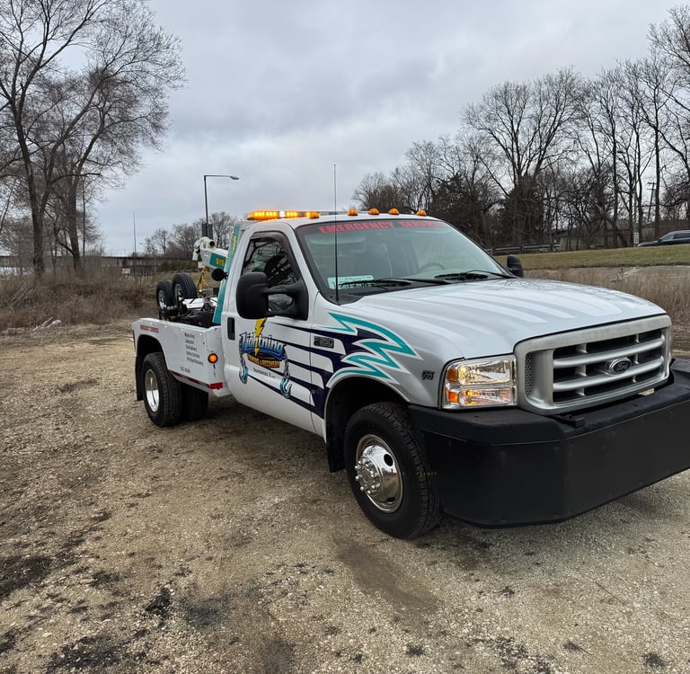 Lightning Towing & Recovery main service truck providing 24/7 towing in Bourbonnais, IL.