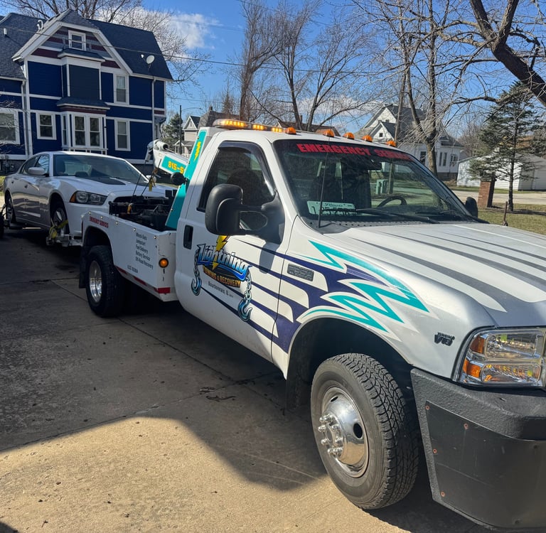 Lightning Towing and Recovery Services Towing a Dodge Charger in Bourbonnais Illinois