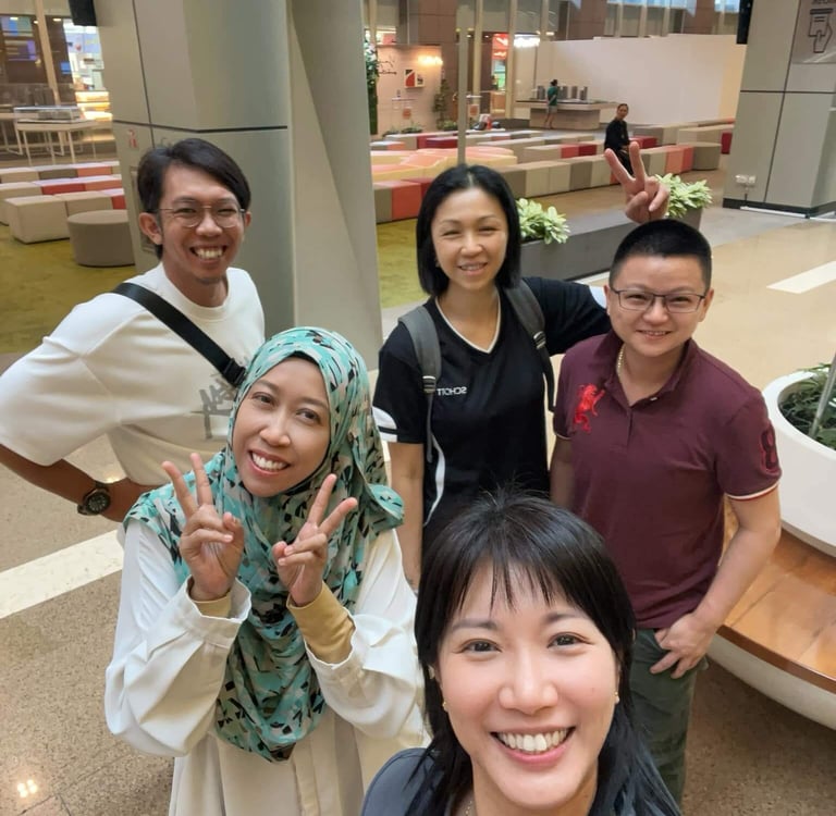 Singapore homeowners celebrating their property milestone with the Lim Sisters