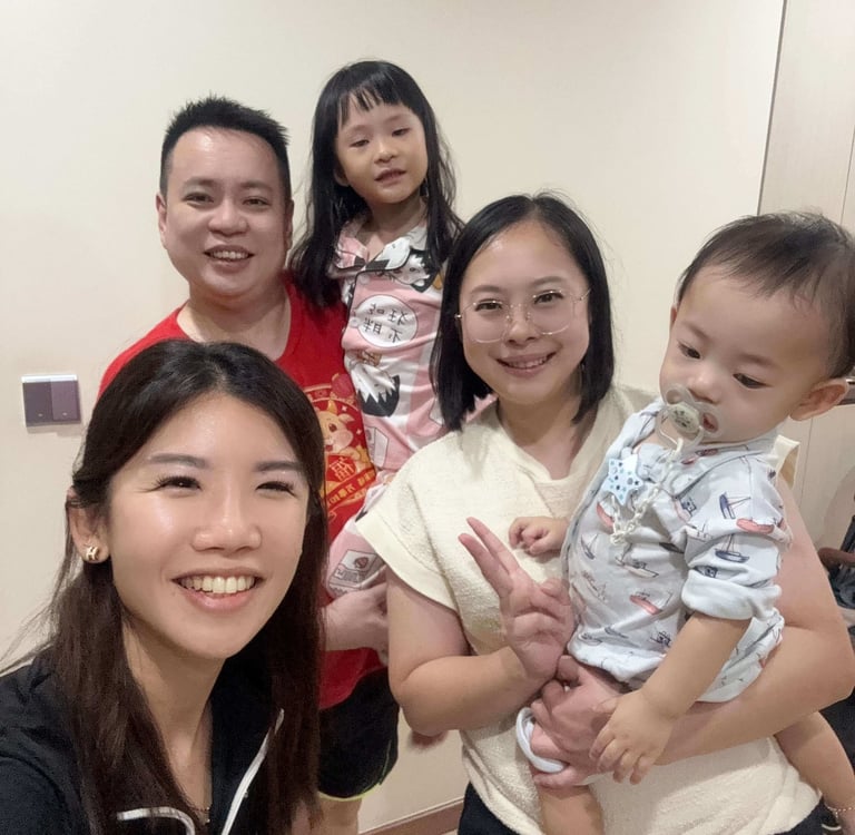 Young family celebrating their new home journey with the Lim Sisters property advisors