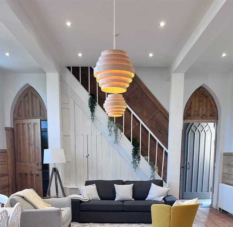 Spacious living area at The Church Rooms holiday let in Witheridge, Devon, featuring original arched