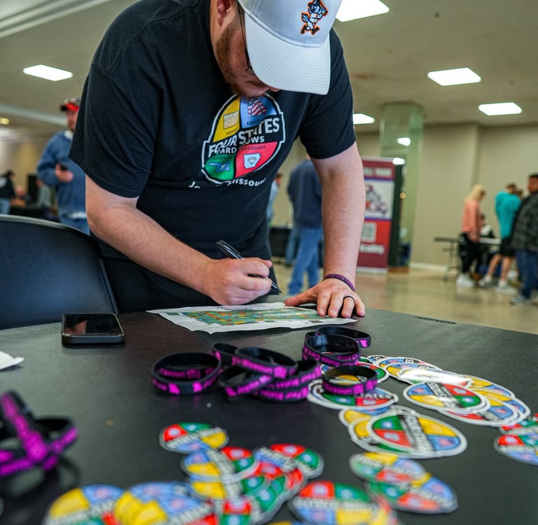 Picture of the free wrist bands and stickers given out to attendees at the Four States Card Show
