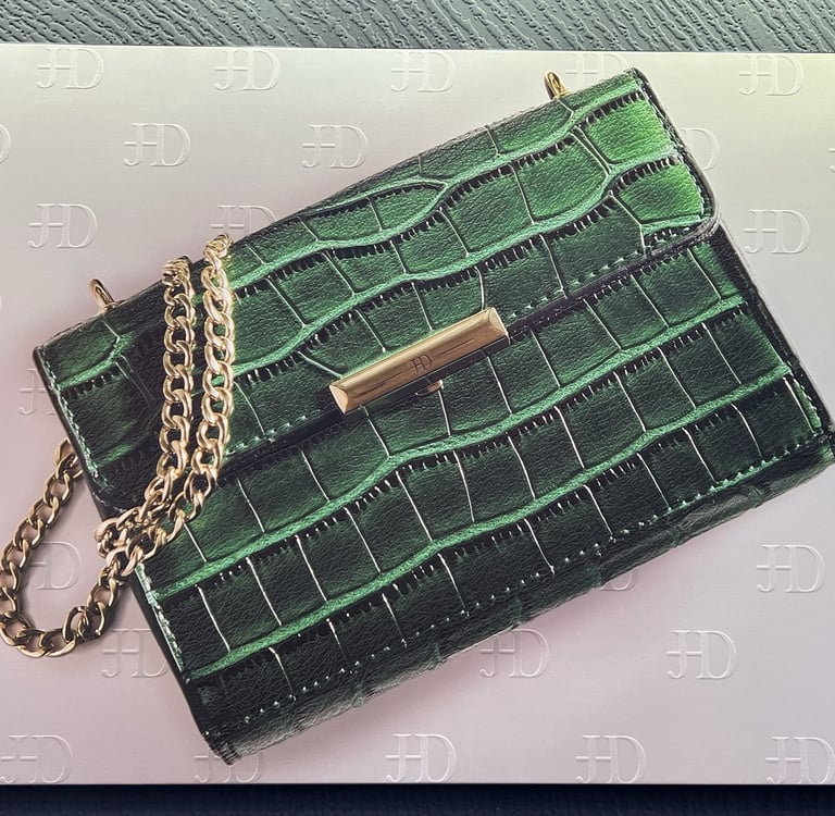 Close-up of Green Purse canvas texture on pearl textile backing