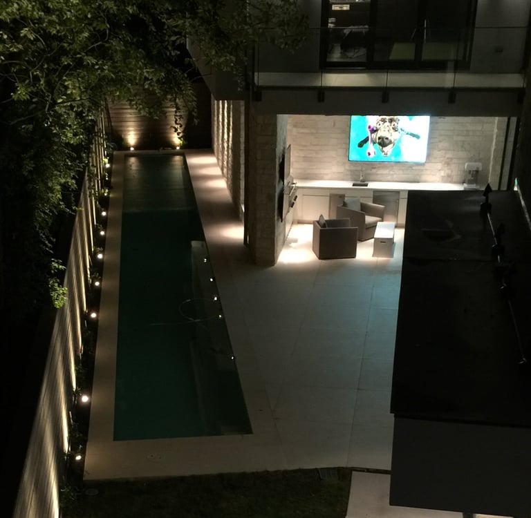 low voltage up lighting along the fenceline