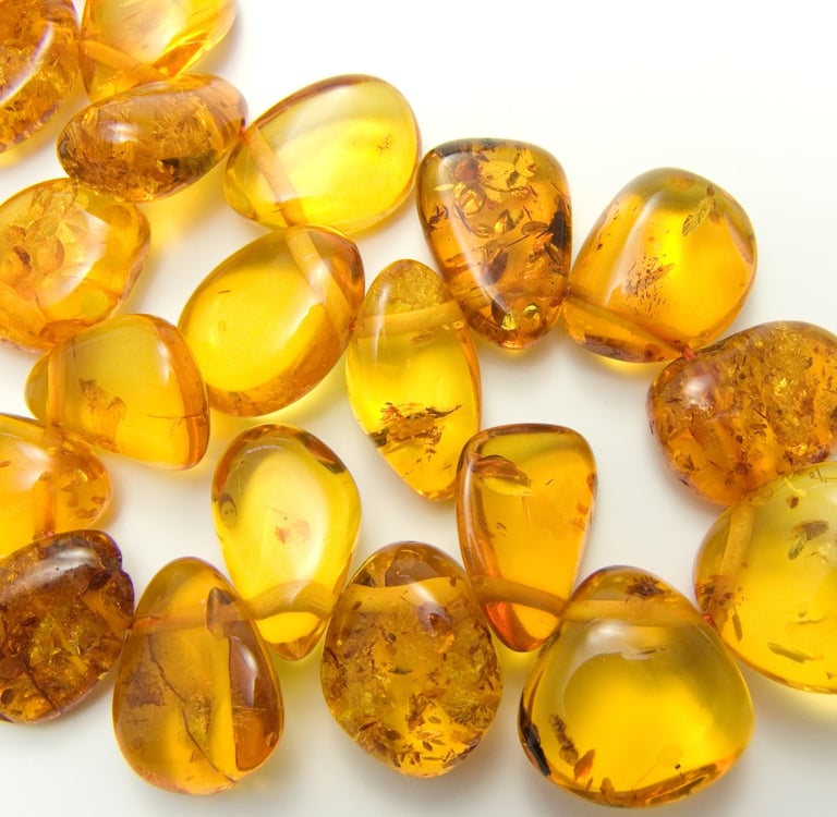 Polished Dominican amber stones with natural inclusions, popular gemstone souvenir from the Caribbean