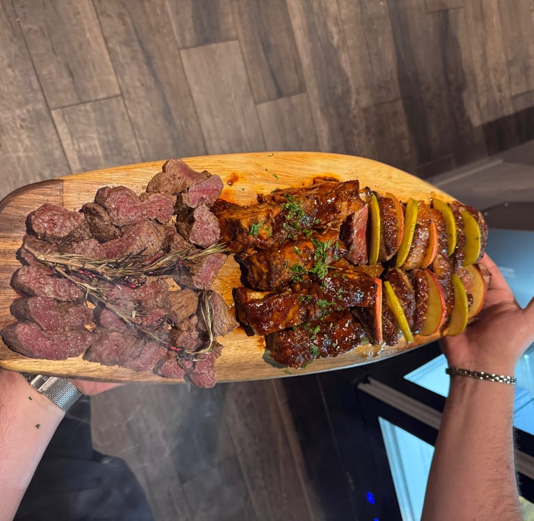 a person holding a large wooden board with steak steak and potatoes
