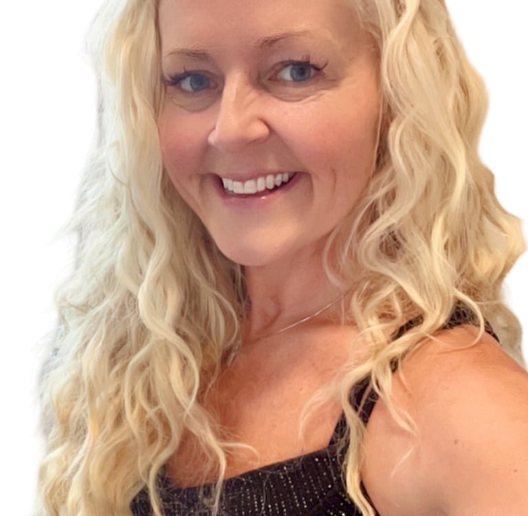 a woman with blonde hair and a black dress