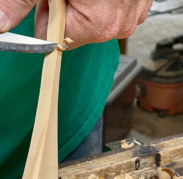 Carefully generating a curly shaving with a sloyd knife