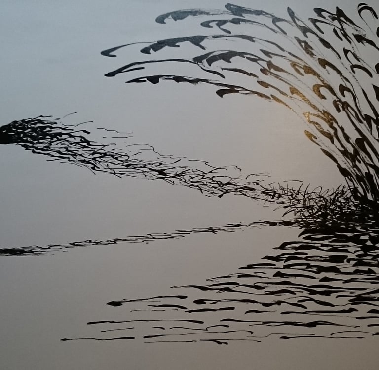 a bird flying over a body of water