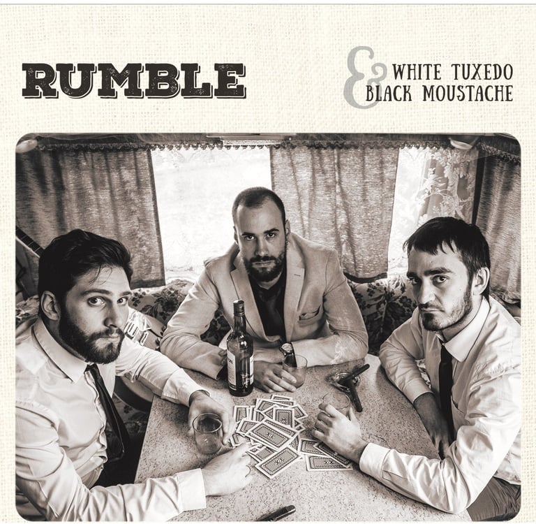 rumble white tuxedo and black moustache album