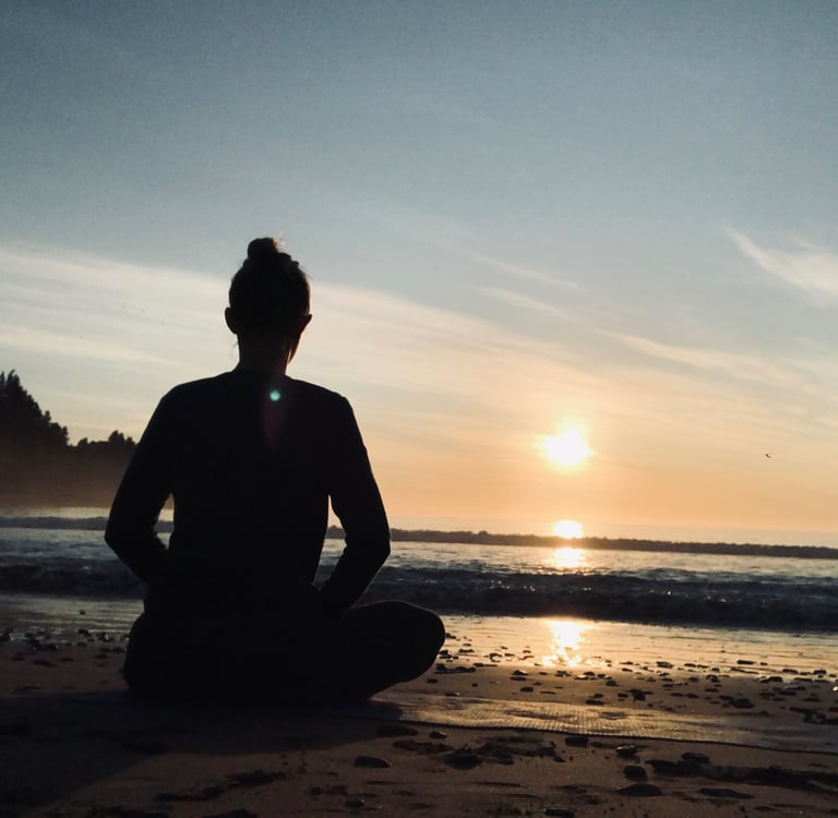 Meditating on a beach in New Zealand with it's fire energy