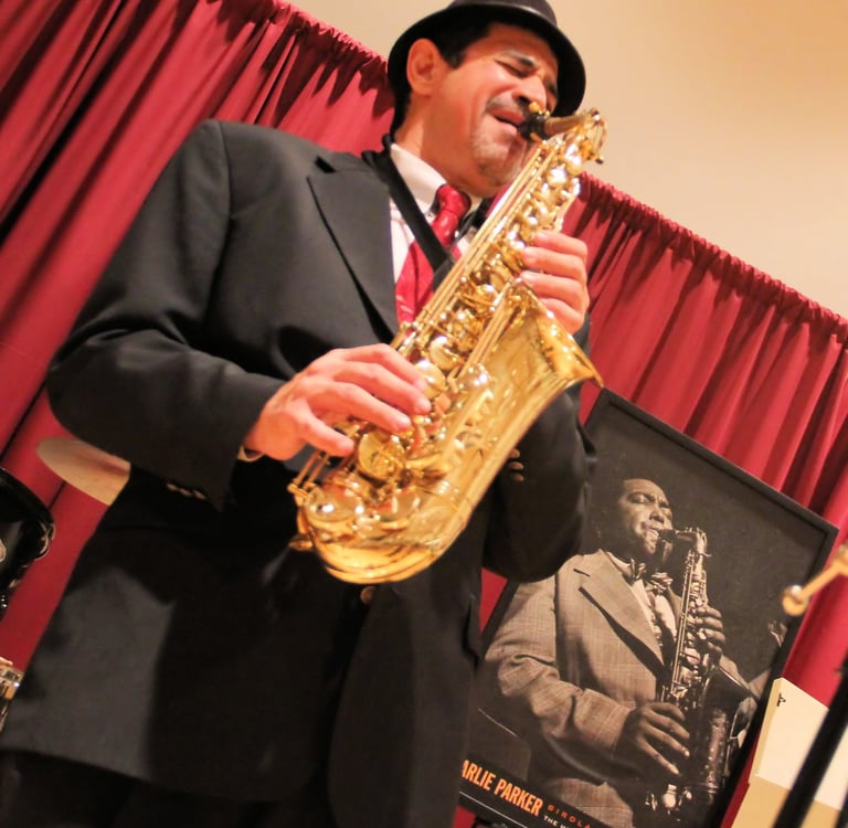 Bobby Ramirez playing alto saxophone 