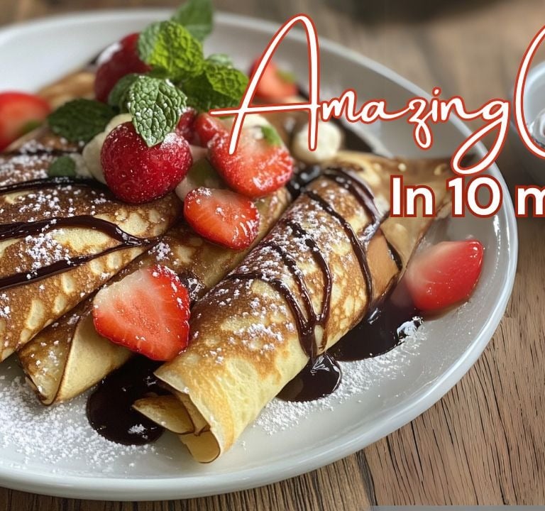 Crepes with strawberries and chocolate syrup