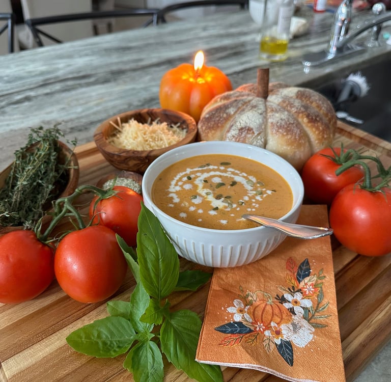 Creamy pumpkin soup with pumpkin shaped sourdough bread