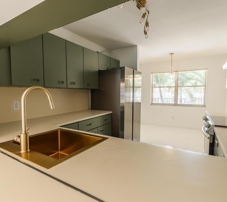 a kitchen with a sink and a window
