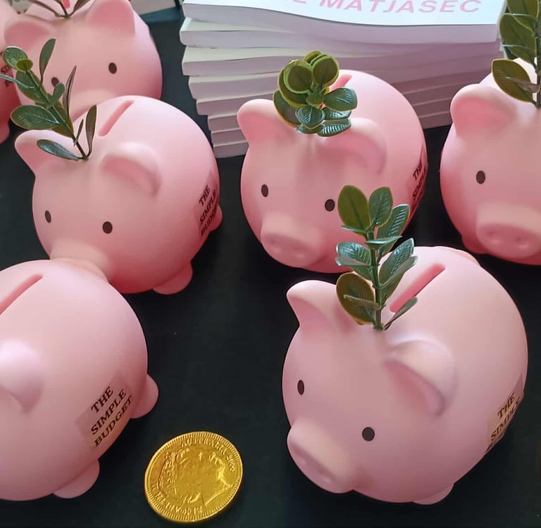 The Simple Budget Piggy Banks with gold coins