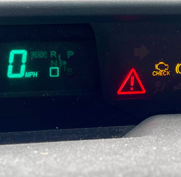 Prius hybrid battery trouble warning light red triangle of death GoGoHybridBattery.com 