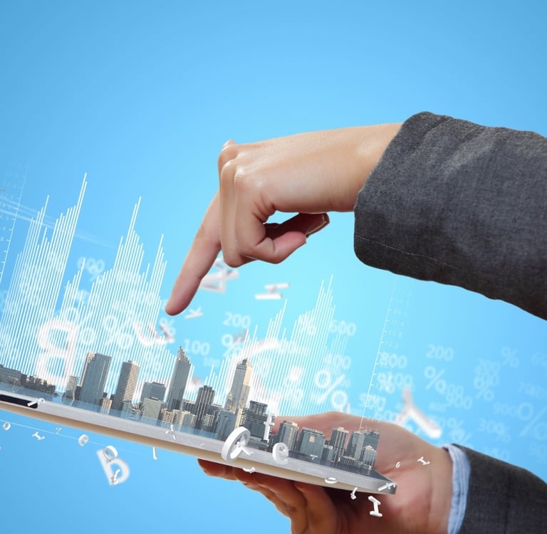 a person's hand holding a laptop computer -digital vs. traditional marketing