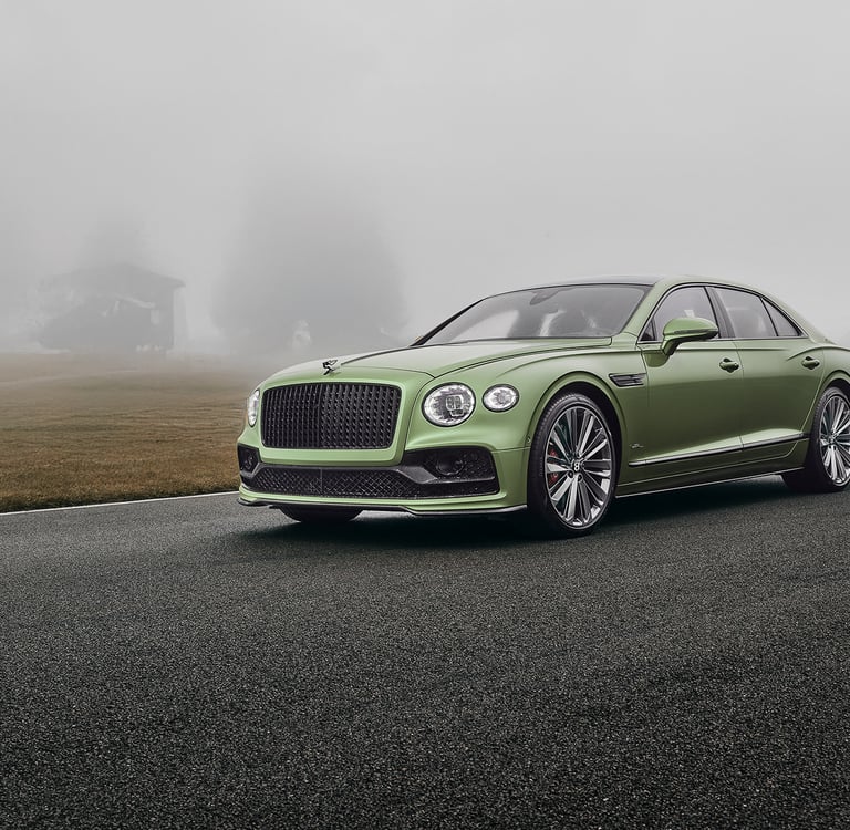 a green bentley flying spur