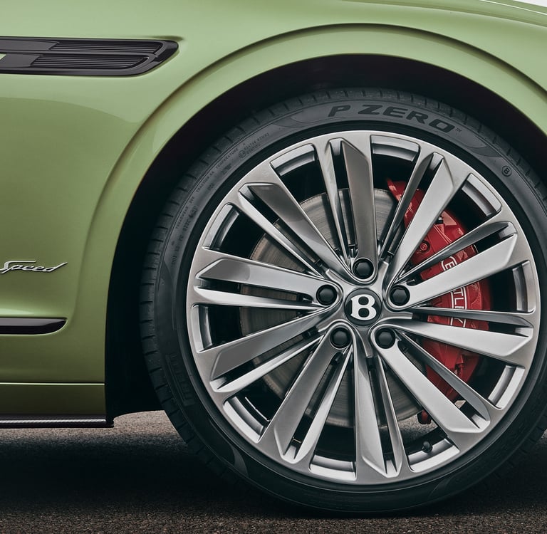 a close up of a car's wheel and tire