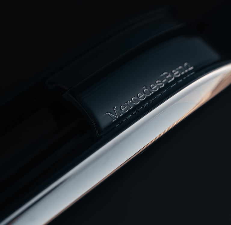 a close up of a mercedes benz door handle