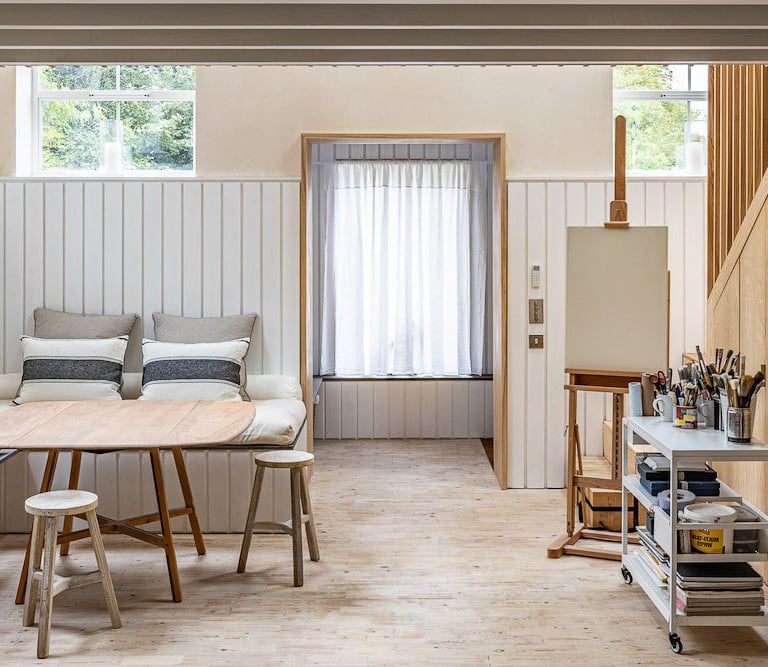 a living room with a couch and a table