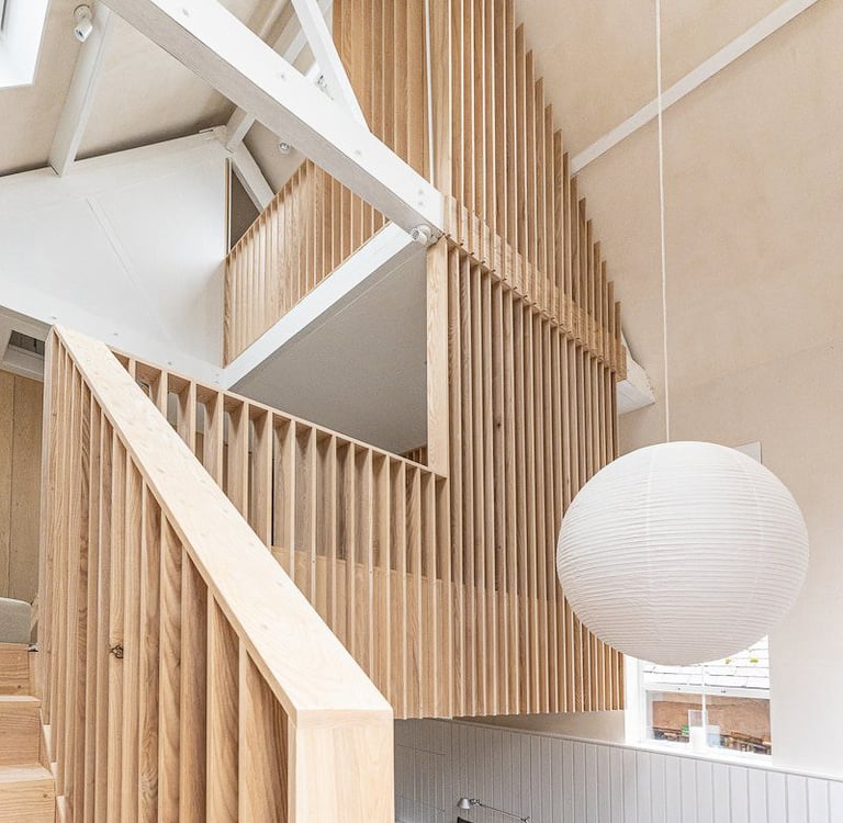 a staircase leading to a loft apartment