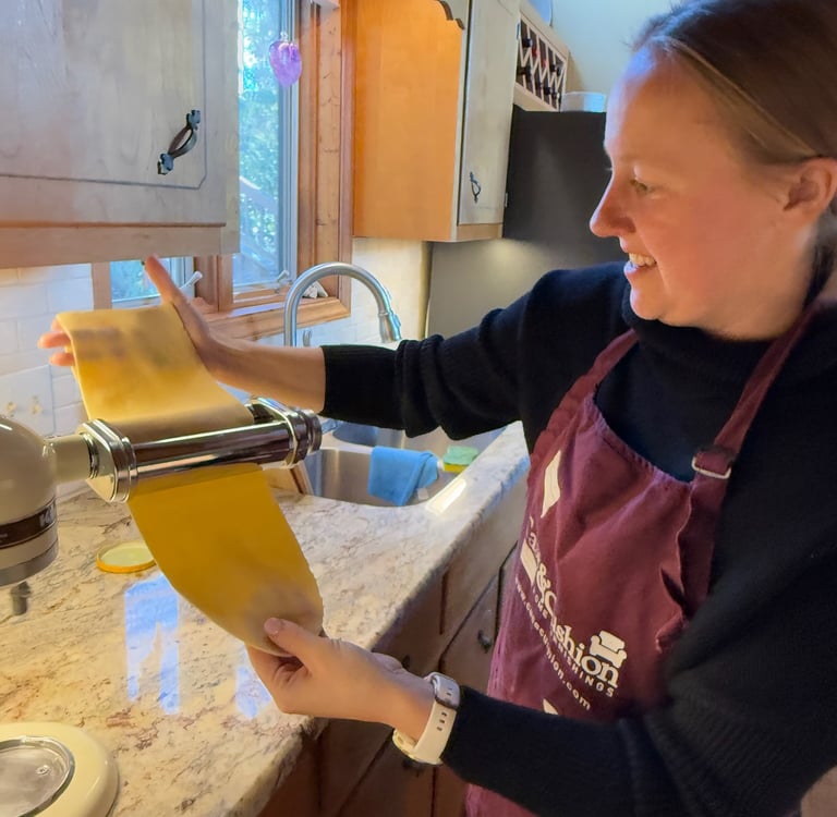 Class participant making an authentic pasta noodle