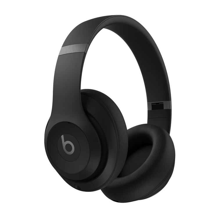 Matte black Beats Studio3 wireless noise cancelling over-ear headphones isolated on white.
