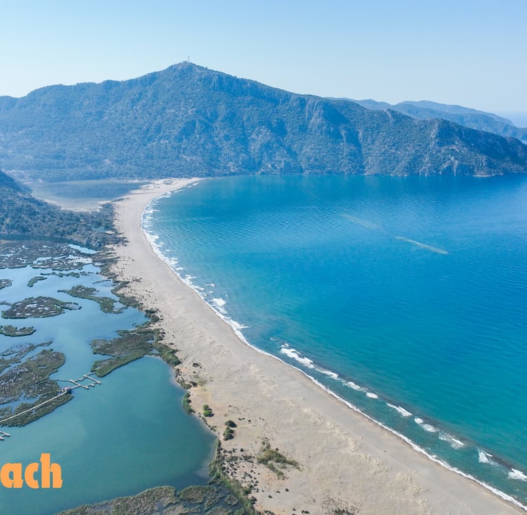İztuzu Beach with a mountain in the background