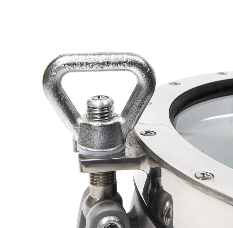 Closing handle on a stainless porthole