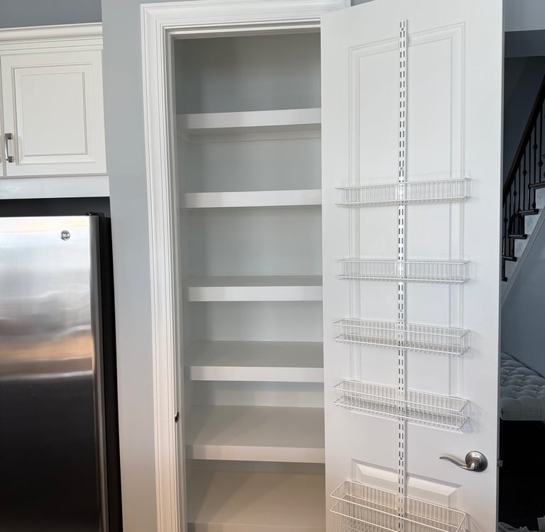 a kitchen pantry with a refrigerator and a refrigerator