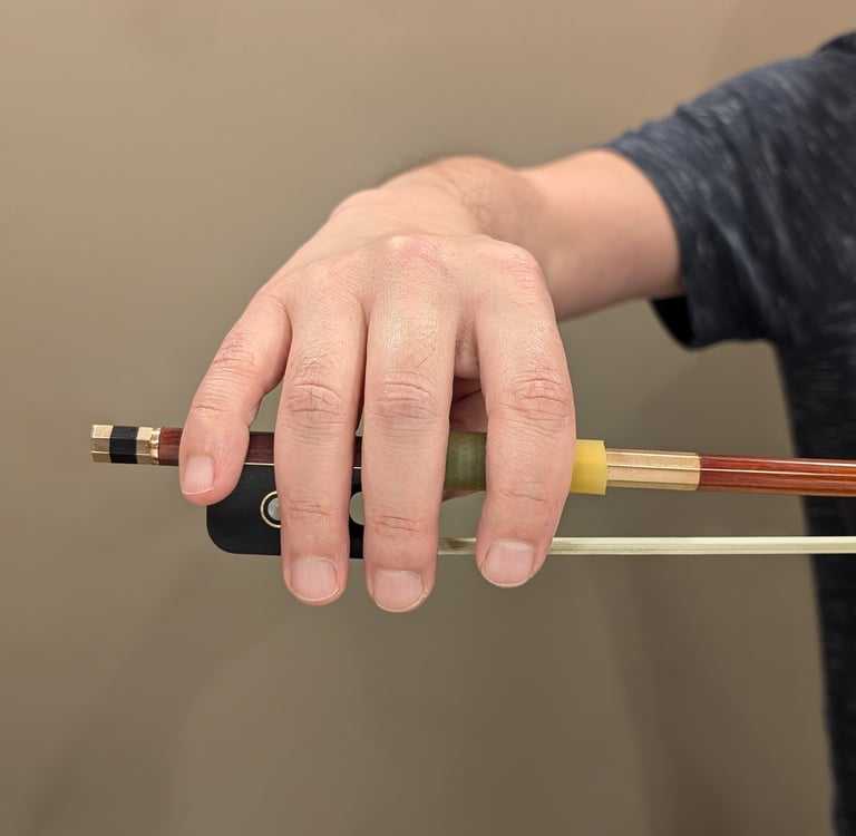 hand dropped on bow stick