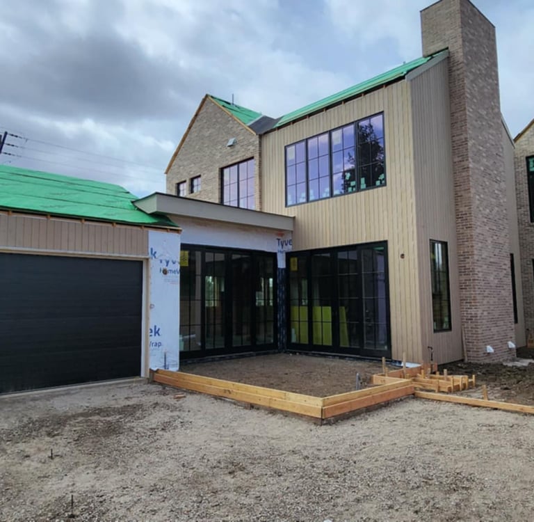 a house with a green roof and a green roof
