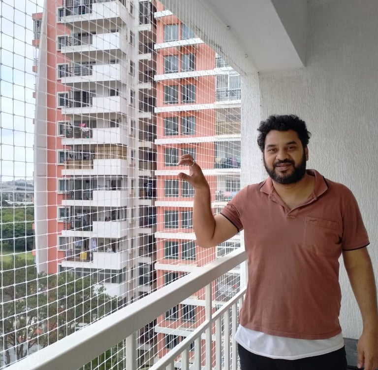 Satisfied Customer of arjilli safety nets with net installed on a balcony