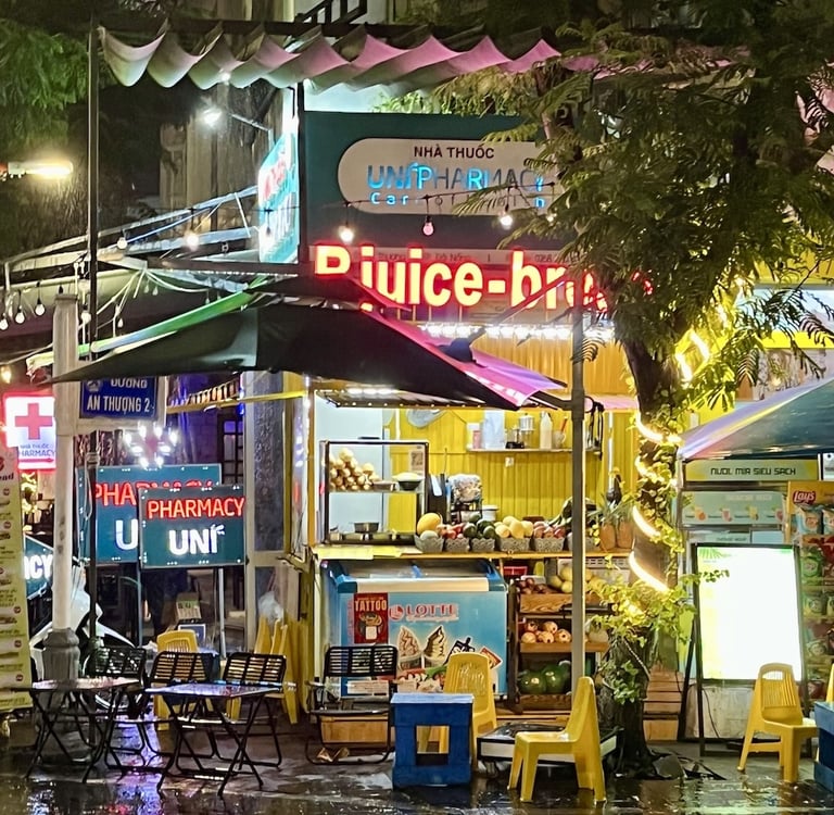 Rainy evening street scene in An Thuong, Da Nang