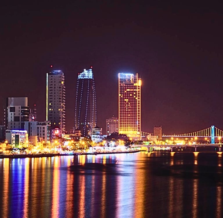 Da Nang's Hai Chau district at night with illuminated skyline and bridges
