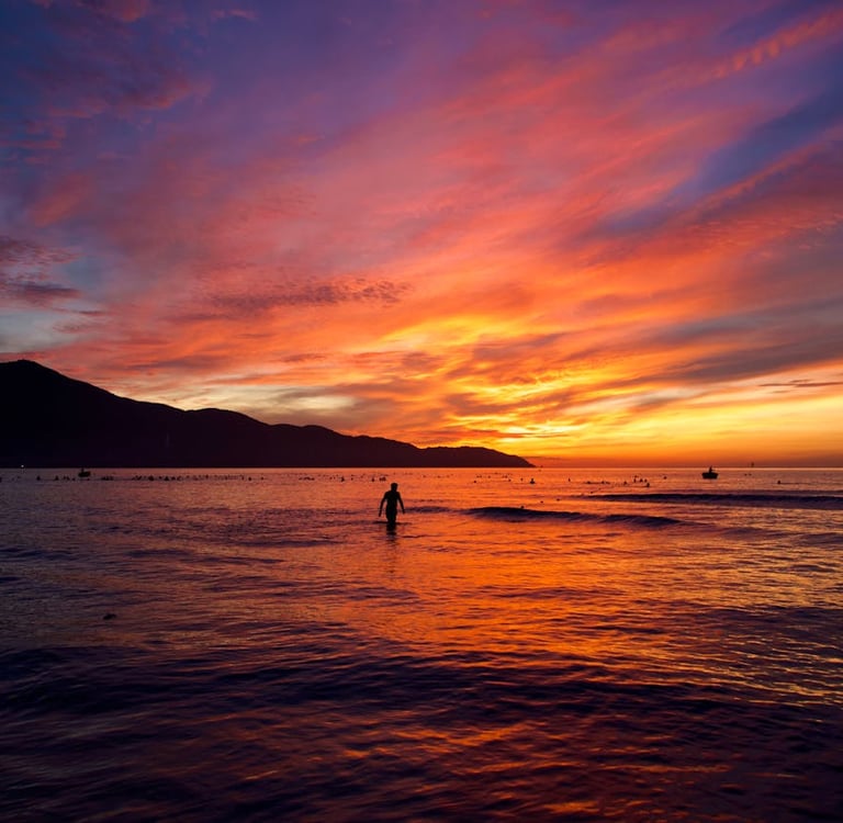 Sunrise at My Khe Beach Da Nang with the Son Tra Peninsula