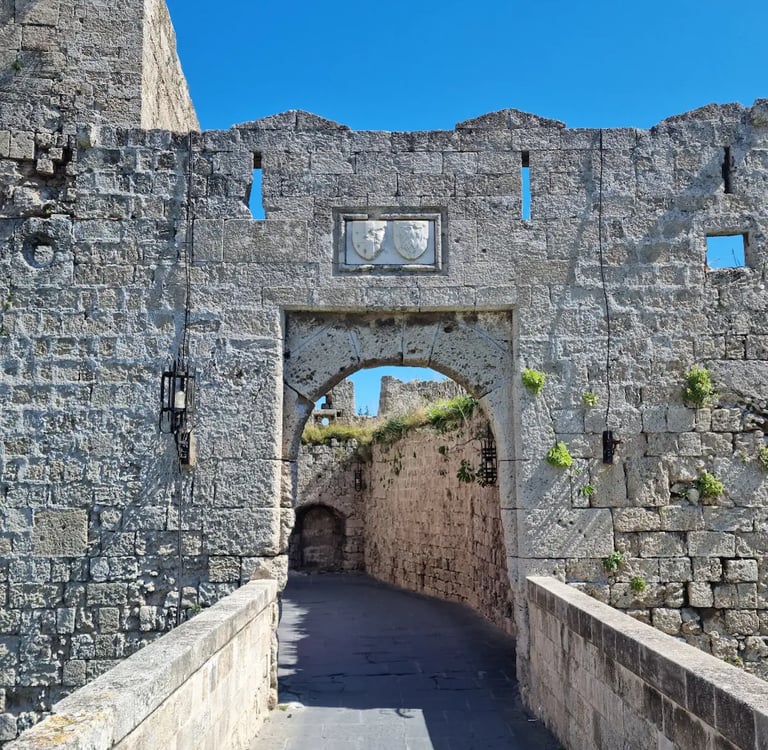 a stone wall with a clock on it