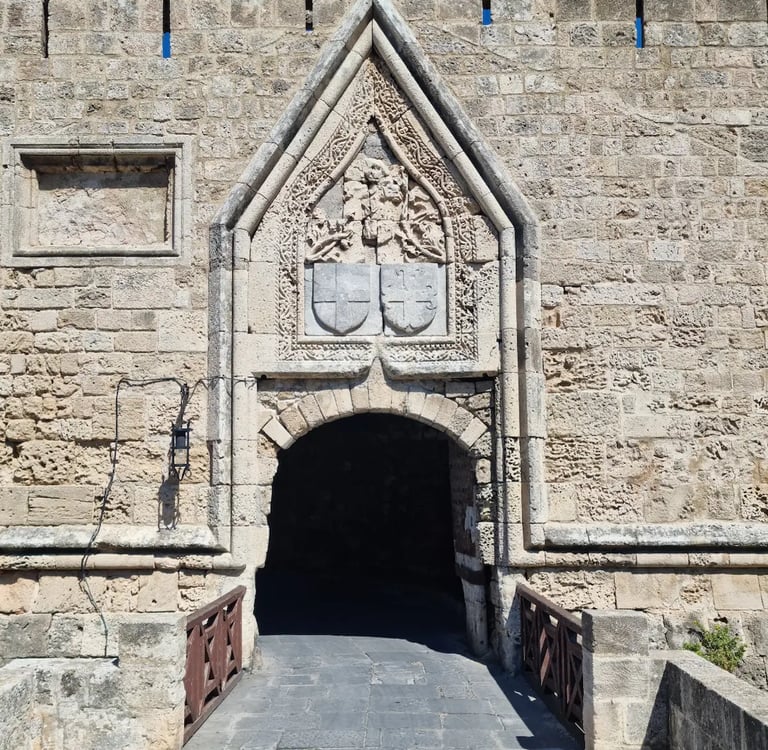 a stone wall with a stone archway and a stone wall