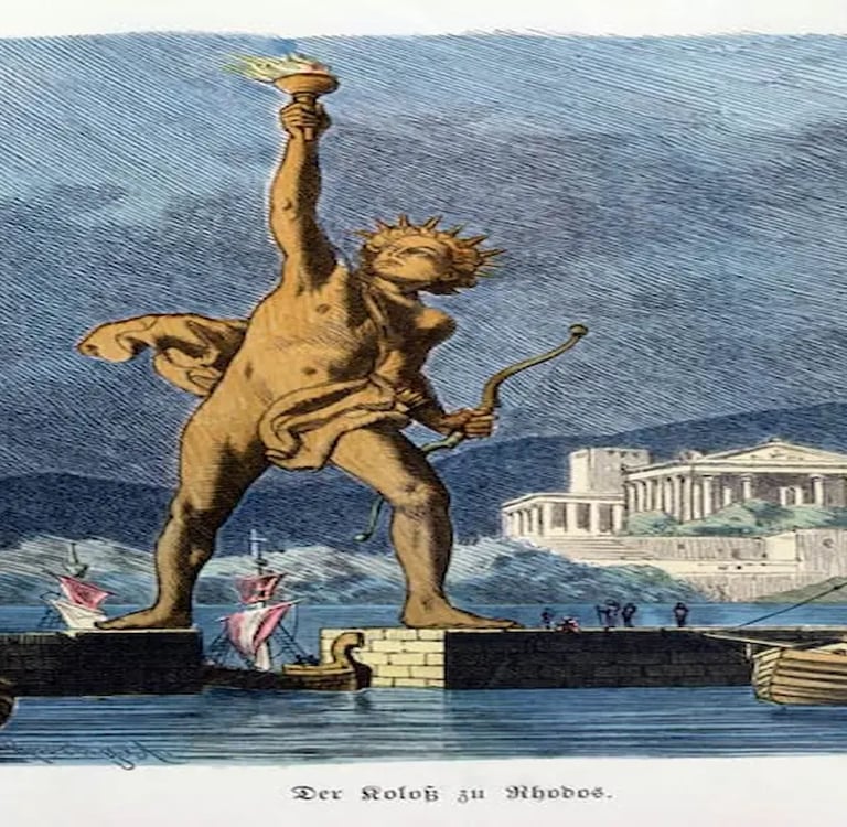 a statue of a statue of a man holding a torch in his hand