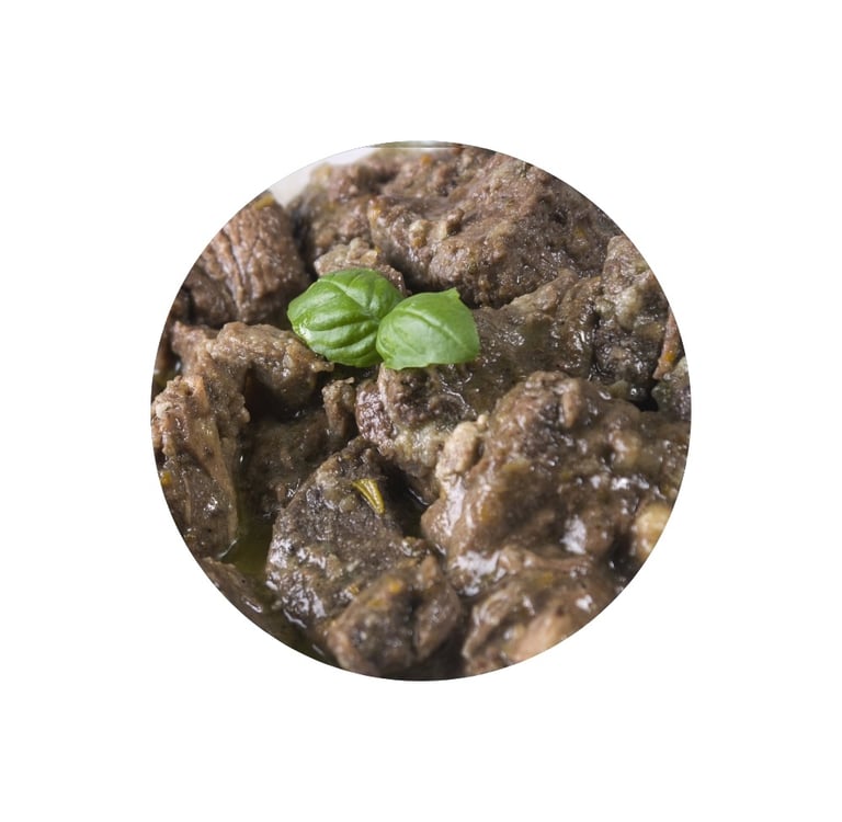 Spicy talawa gosht with fried meat pieces coated in red masala
