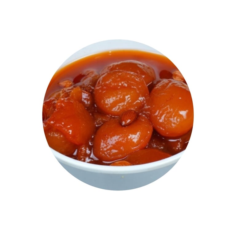 Bowl of qubani ka meetha with stewed apricots in syrup topped with almonds