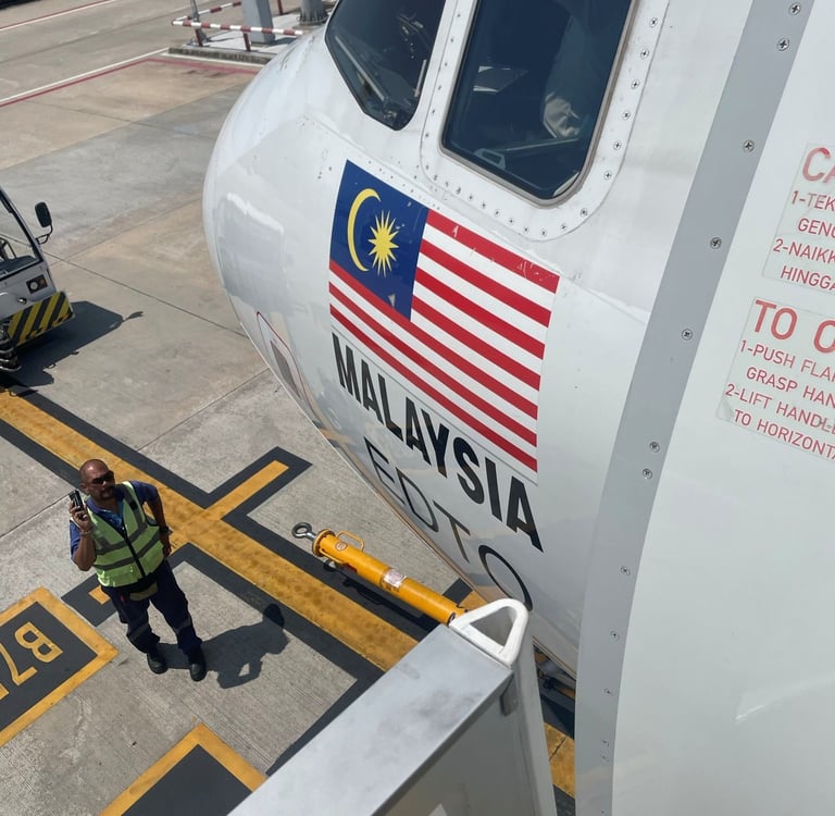 samolot z flagą Malezji