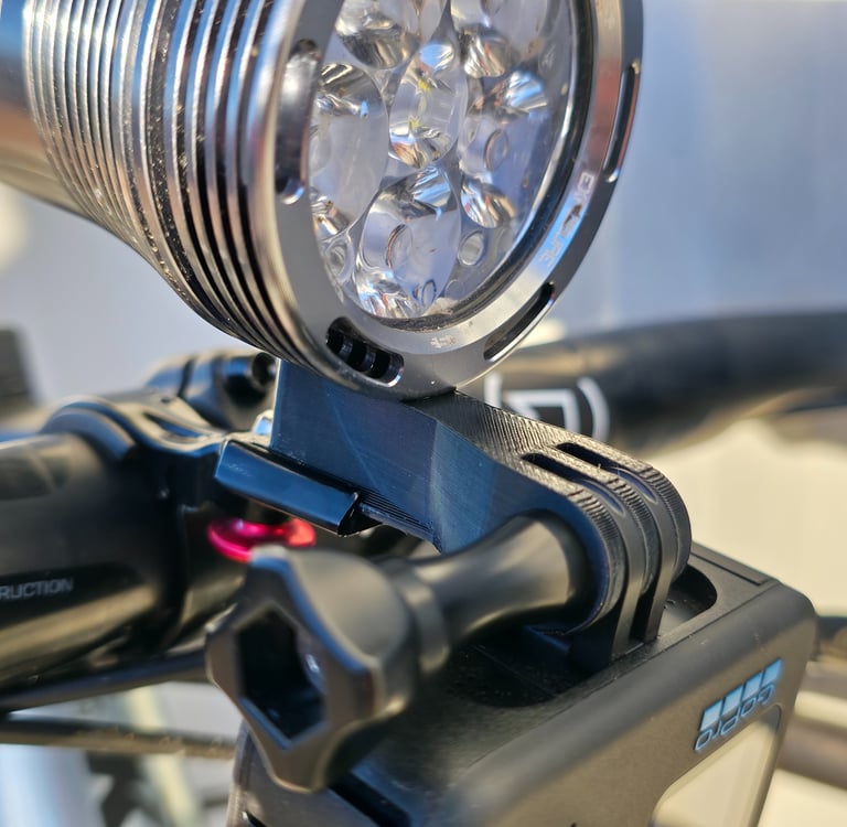 Duo Mount on the bike with gopro and exposure light mounted on it