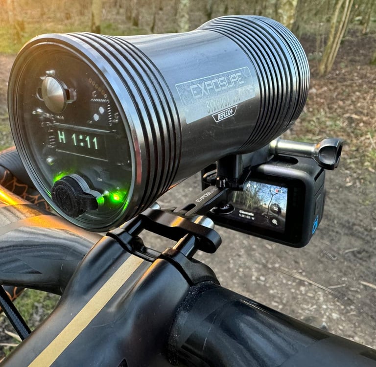 duo mount with exposure light and gopro in forest