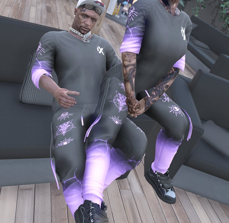 a couple of people in wetsuits and one person in a wetsuit