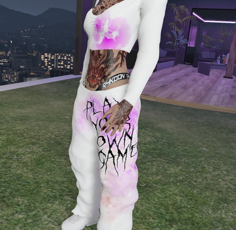 a woman in a white top and pants with a pink shirt